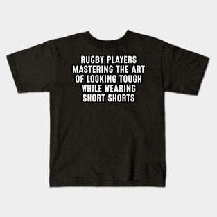 Rugby players Mastering the art of looking tough while wearing short shorts Kids T-Shirt